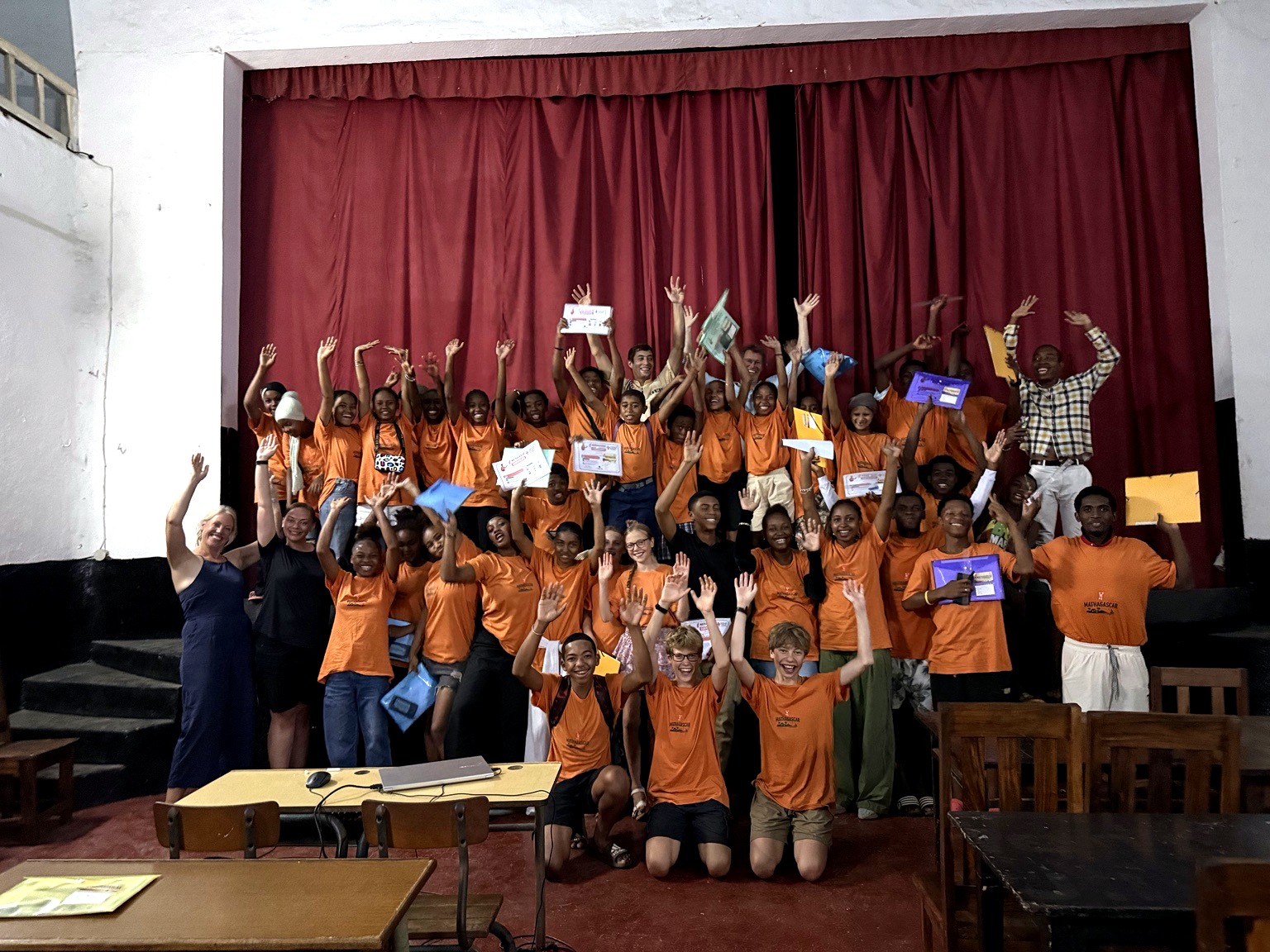 Mathagascar students celebrating completion of their course